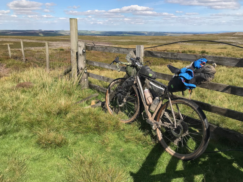 Bike leant up against fence